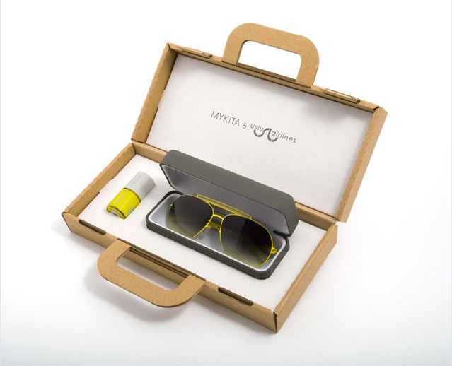 Uslu Airlines Yellow Nail Polish in an etui together with an etui that has a yellow mykita glasses inside